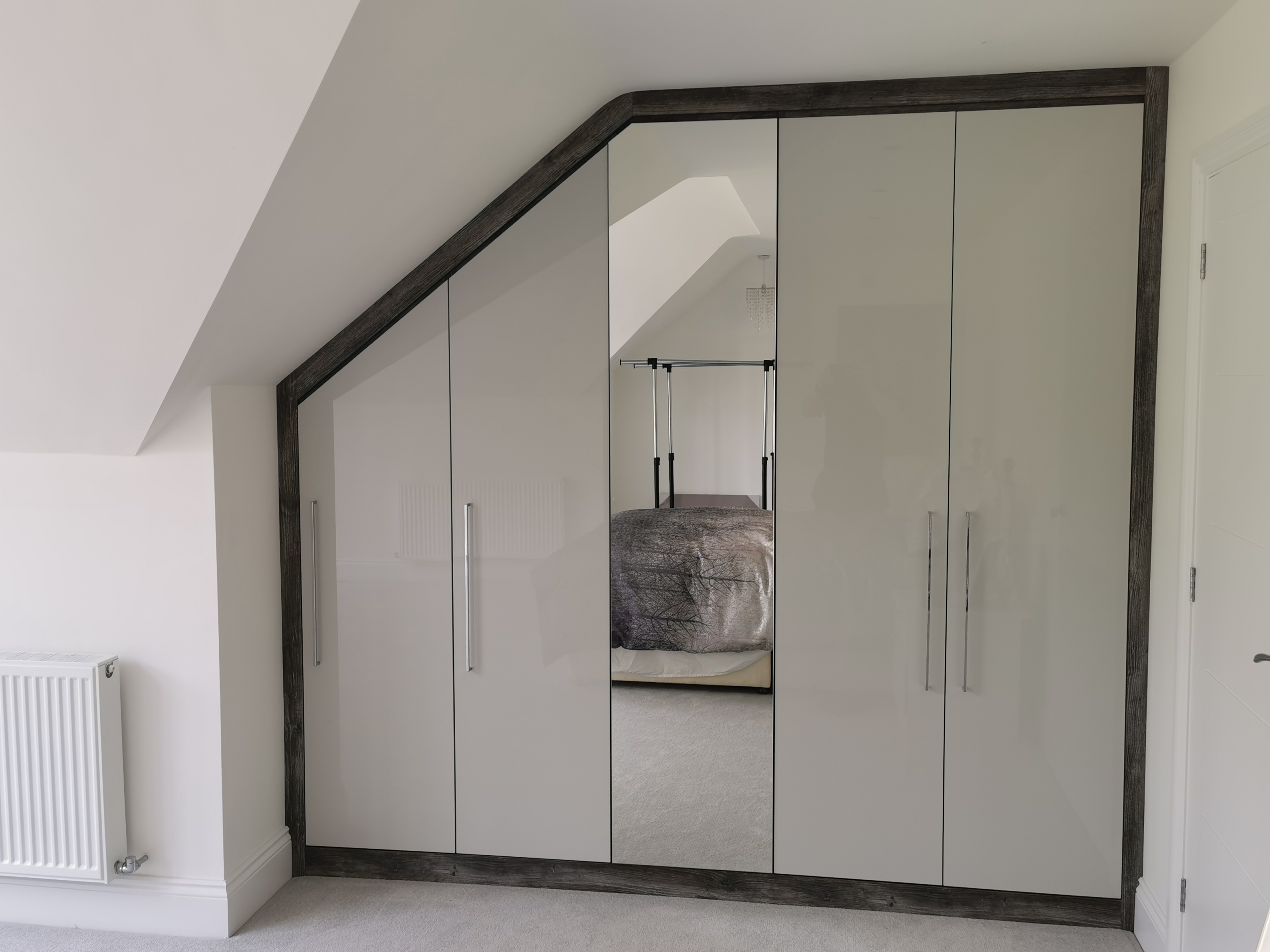 Cream Gloss Angled Wardrobes with Mirror